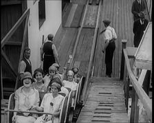 A Large Group of Female Civilians Enjoying a Roller Coaster Ride, 1926. Creator: British Pathe Ltd