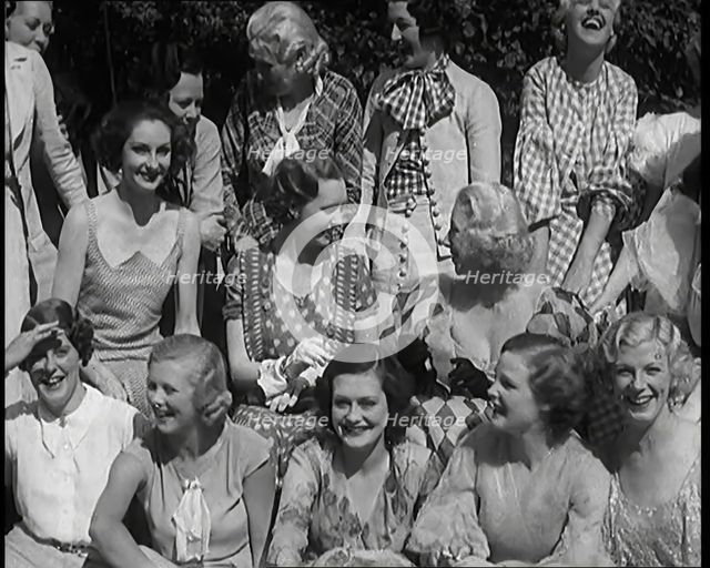 A Large Group of Female Civilians Posing for Photos, 1931. Creator: British Pathe Ltd.