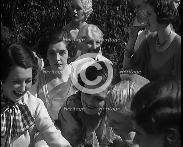 A Large Group of Female Civilians Posing for Photos, 1931. Creator: British Pathe Ltd.