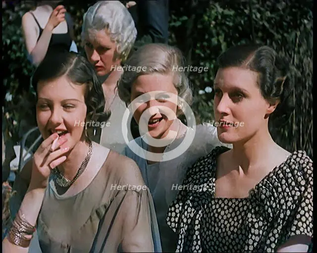 A Large Group of Female Civilians Posing for Photos, 1931. Creator: British Pathe Ltd.