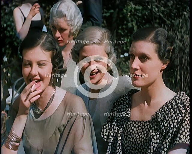 A Large Group of Female Civilians Posing for Photos, 1931. Creator: British Pathe Ltd.