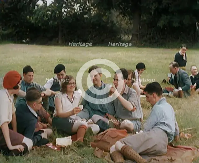 A Large Group of Hikers Having Drinks in a Field, 1931. Creator: British Pathe Ltd.