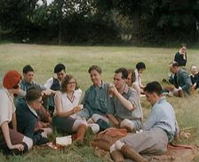 A Large Group of Hikers Having Drinks in a Field, 1931. Creator: British Pathe Ltd
