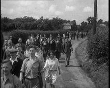 A Large Group of Hikers Walking in the Countryside, 1931. Creator: British Pathe Ltd
