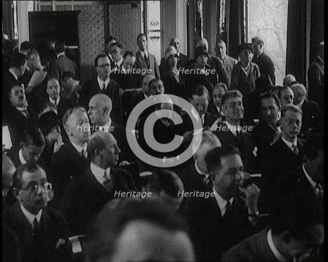 A Large Group of Male and Female Delegates from the League of Nations Sitting in a Room, 1924. Creator: British Pathe Ltd.