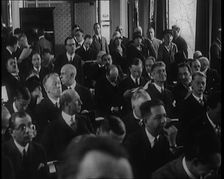 A Large Group of Male and Female Delegates from the League of Nations Sitting in a Room, 1924. Creator: British Pathe Ltd