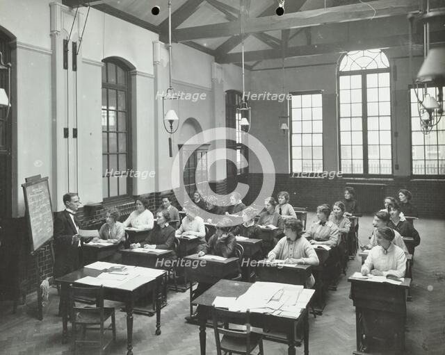 A lesson at the Fulham Girl Clerks' Training School, Fulham, London, 1915. Artist: Unknown.