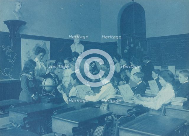 A lesson in globe making. Children in class in a Washington, D.C., school, 1899. Creator: Frances Benjamin Johnston.