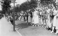 A line of people, c1920s