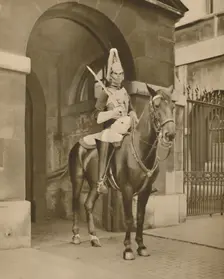 A Living Statue in Whitehall: The Lifeguards Sentry c1935. Creator: Unknown