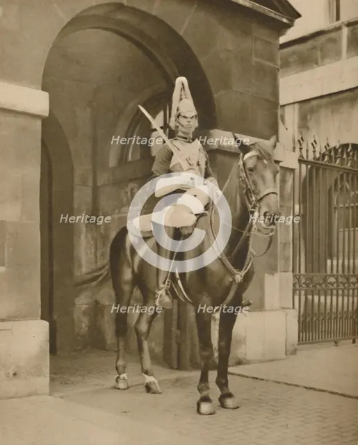 'A Living Statue in Whitehall: The Lifeguards' Sentry', c1935. Creator: Unknown.