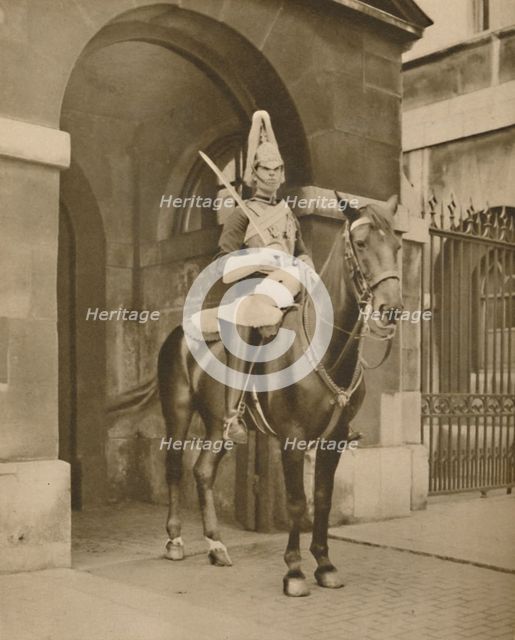 'A Living Statue in Whitehall: The Lifeguards' Sentry', c1935. Creator: Unknown.