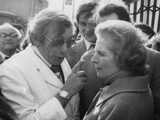 A local shopkeeper remonstrates with Margaret Thatcher in South London, c1979-1990