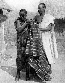 A man and a boy from the Ashanti people, Ghana, Africa, 1936.Artist: LNA Images