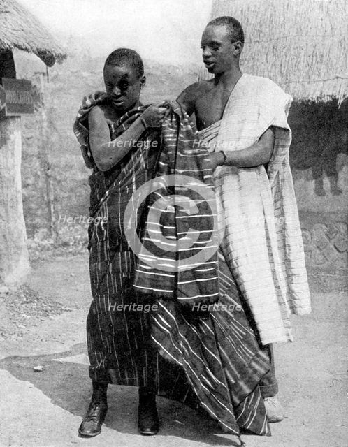 A man and a boy from the Ashanti people, Ghana, Africa, 1936.Artist: LNA Images