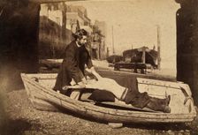 A man and a boy with bare torso in a rowing boat grounded on a beach..., c1860s. Creator: Unknown