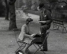 A Man and Woman Taking Notes in a Park, 1941. Creator: British Pathe Ltd