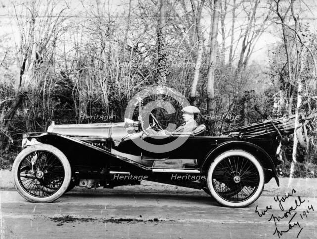 A man at the wheel of a Hispano-Suiza Alfonso XIII, 1914. Artist: Unknown
