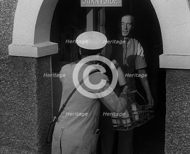 A Man Delivering Milk, 1940. Creator: British Pathe Ltd.