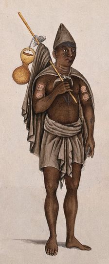A man in a loincloth is carrying a stick with a cloth and pot. Creator: Unknown