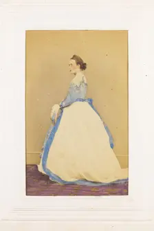 A man in drag standing side-on, [between 1890 and 1899?]. Creator: Unknown