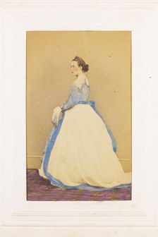 A man in drag standing side-on, [between 1890 and 1899?]. Creator: Unknown