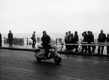 A man on a Lambretta scooter, taking part in the Daily Express rally, 1953