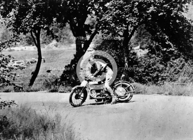 A man on a Norton bike taking part in the Belgian Grand Prix, 1924. Artist: Unknown