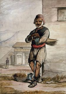 A man of Simla, standing in a prison with manacles around his ankles, 1866. Creator: R Clint