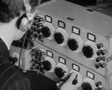 A Man Operating a Radio, 1940. Creator: British Pathe Ltd