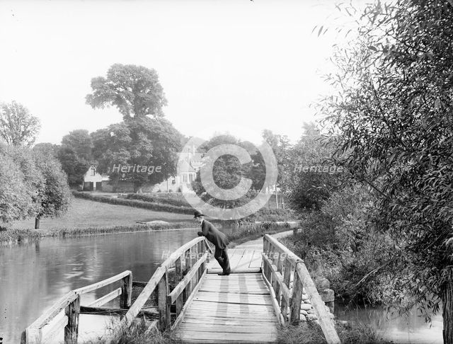 A man leaning on the handrail of the last footbridge, Iffley, Oxford, Oxfordshire, 1885. Artist: Henry Taunt