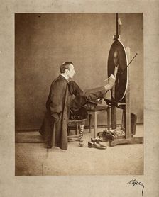 A man painting an oval portrait using his feet, c1870. Creator: Joseph Dupont