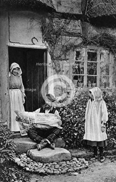 A man reading The Daily Mail, Shropshire, c1922. Artist: AW Cutler