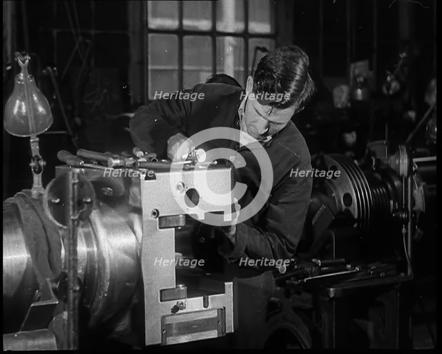 A Man Working in a Factory, 1940. Creator: British Pathe Ltd.