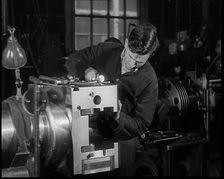 A Man Working in a Factory, 1940. Creator: British Pathe Ltd