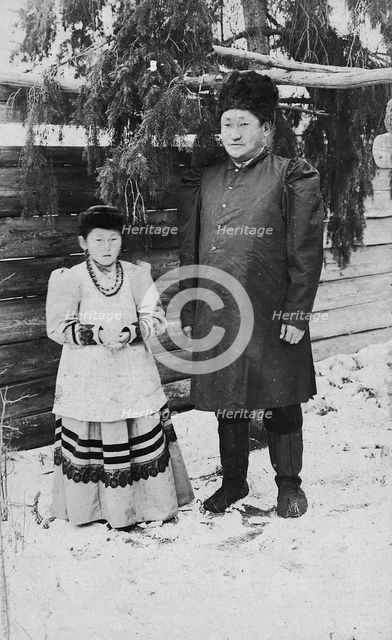 A man with his daughter, late 19th cent - early 20th cent. Creator: I Popov.