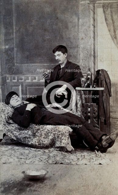 A man taking the pulse of another man, between 1800 and 1899. Creator: Unknown.