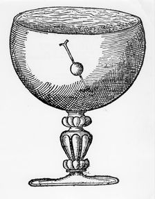 A magnetized needle pushed through a ball of cork, floating submerged in a goblet of water, 1600