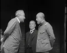A Male Japanese Politician and a Male Military Leader Talking Together While Another Male..., 1937. Creator: British Pathe Ltd