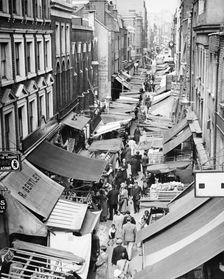 A market along Berwick Street, Soho, London, 1950s. Creator: Unknown