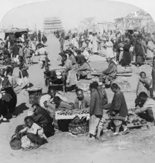 A market in the Tartar (northern) city, looking toward Drum Tower Peking (Beijing), China, 1901. Artist: Underwood & Underwood