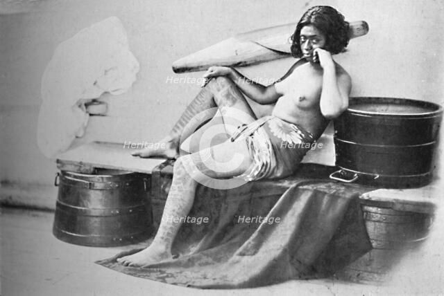 A Marquesa woman with the lower part of the legs fully tattooed, 1902. Artist: Unknown.
