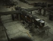 A mating operation on a transport plane...Consolidated Aircraft Corp..., Fort Worth, Texas, 1942. Creator: Howard Hollem