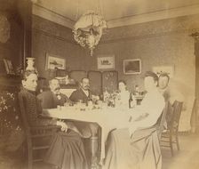 A meal with friends in the drawing room, Dom Smith, Vladivostok, Russia, (1899?). Creator: Frederick S. Pray