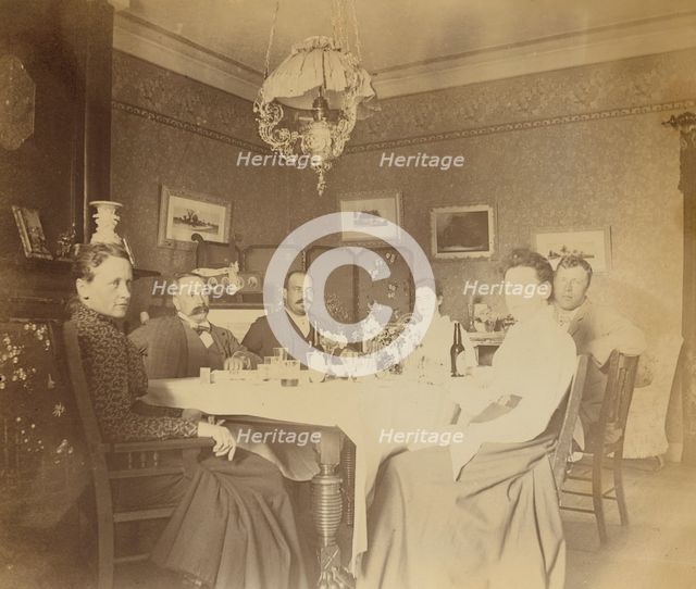 A meal with friends in the drawing room, Dom Smith, Vladivostok, Russia, (1899?). Creator: Frederick S. Pray.