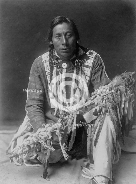 A medicine pipe-Piegan, c1910. Creator: Edward Sheriff Curtis.