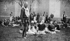 A meeting of Mirdite mountaineers and their town kinsmen outside a Scutari cathedral, Turkey, 1922