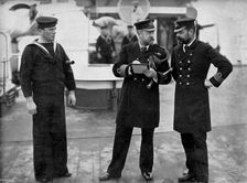 A message for the captain of the battleship HMS Magnificent 1896. Artist: Gregory & Co