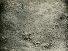 A Mine Crater in High Wood (1919). Creator: Unknown