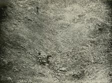 A Mine Crater in High Wood (1919). Creator: Unknown